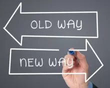 Two arrows depicting the old way as backwards and the new way as forwards.